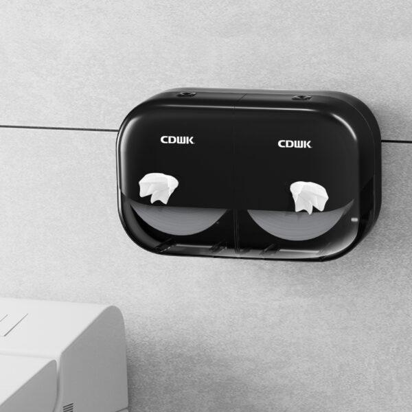 Twin jumbo roll paper dispenser